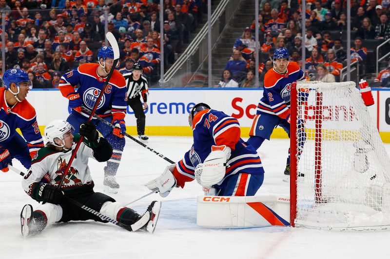 Mar 22, 2023; Edmonton, Alberta, CAN; Arizona Coyotes forward Clayton Keller (9) scores a goal during the second period against Edmonton Oilers goaltender Stuart Skinner (74) at Rogers Place. Mandatory Credit: Perry Nelson-USA TODAY Sports