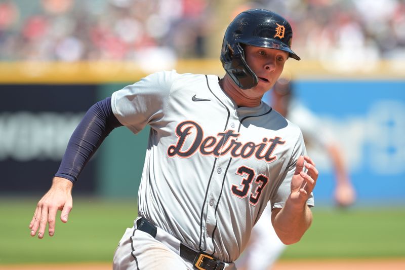 May 8, 2024; Cleveland, Ohio, USA; Detroit Tigers designated hitter Colt Keith (33) rounds third base en route to scoring during the fourth inning against the Cleveland Guardians at Progressive Field. Mandatory Credit: Ken Blaze-USA TODAY Sports