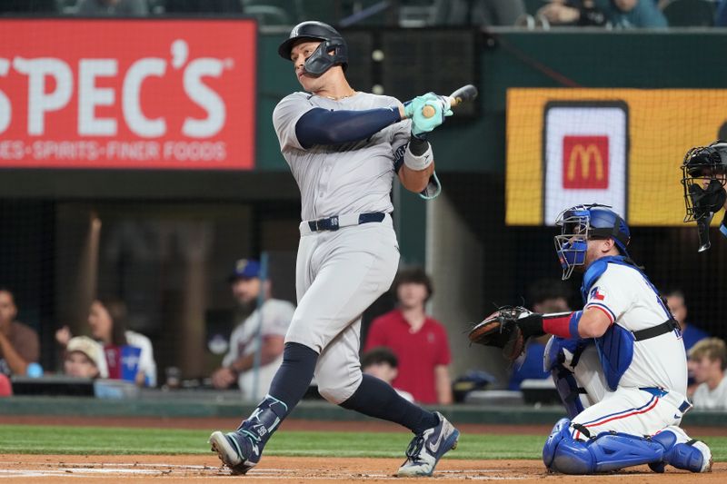 Sep 3, 2024; Arlington, Texas, USA; New York Yankees center fielder Aaron Judge (99) bats against the Texas Rangers during the first inning at Globe Life Field. Mandatory Credit: Jim Cowsert-Imagn Images