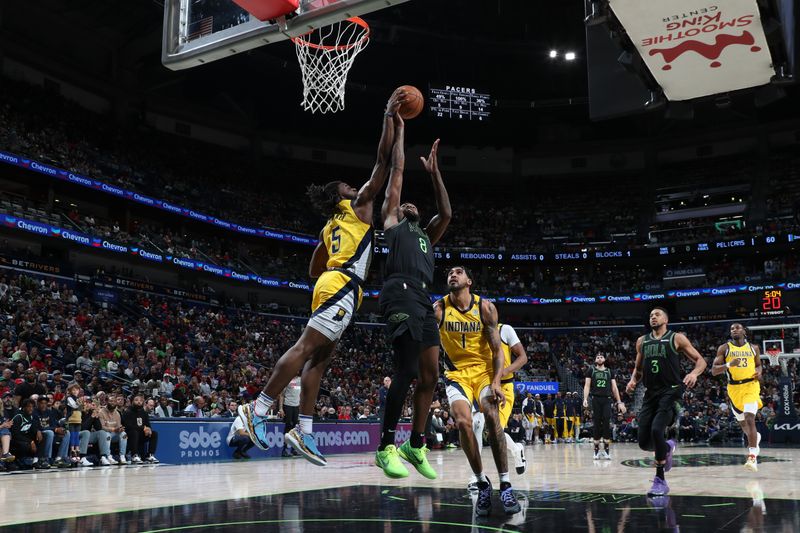 NEW ORLEANS, LA - MARCH 1:  Jarace Walker #5 of the Indiana Pacers  and Naji Marshall #8 of the New Orleans Pelicans battle for a rebound on March 1, 2024 at the Smoothie King Center in New Orleans, Louisiana. NOTE TO USER: User expressly acknowledges and agrees that, by downloading and or using this Photograph, user is consenting to the terms and conditions of the Getty Images License Agreement. Mandatory Copyright Notice: Copyright 2024 NBAE (Photo by Layne Murdoch Jr./NBAE via Getty Images)