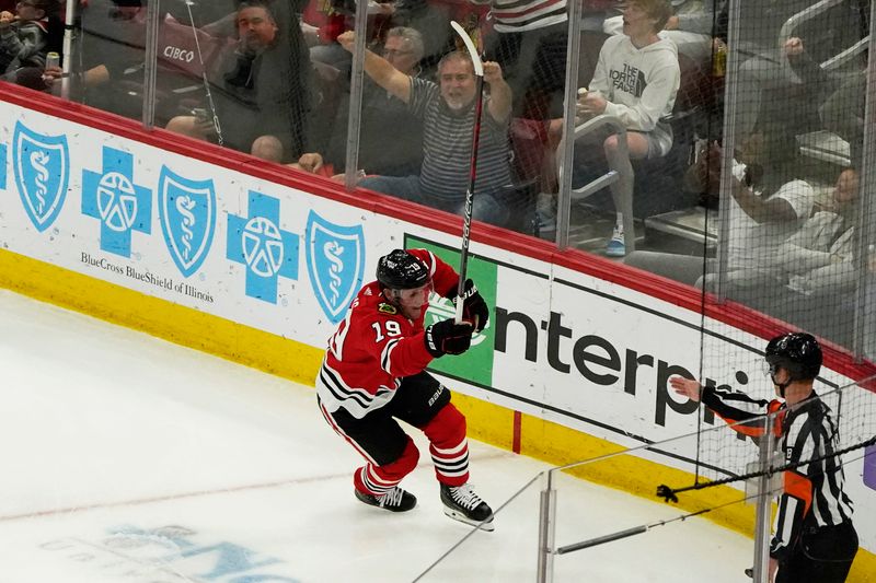 Apr 13, 2023; Chicago, Illinois, USA; Chicago Blackhawks center Jonathan Toews (19) celebrates his goal against the Philadelphia Flyers in his last game as a Blackhawk during the second period at United Center. Mandatory Credit: David Banks-USA TODAY Sports