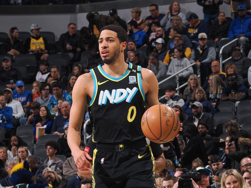 INDIANAPOLIS, IN - APRIL 5:  Tyrese Haliburton #0 of the Indiana Pacers handles the ball during the game  on April 5, 2024 at Gainbridge Fieldhouse in Indianapolis, Indiana. NOTE TO USER: User expressly acknowledges and agrees that, by downloading and or using this Photograph, user is consenting to the terms and conditions of the Getty Images License Agreement. Mandatory Copyright Notice: Copyright 2024 NBAE (Photo by Ron Hoskins/NBAE via Getty Images)