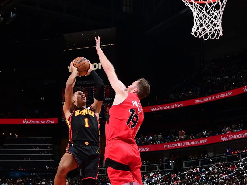 ATLANTA, GA - February 23: Jalen Johnson #1 of the Atlanta Hawks drives to the basket during the game as Jakob Poeltl #19 of the Toronto Raptors plays defense on February 23, 2024 at State Farm Arena in Atlanta, Georgia.  NOTE TO USER: User expressly acknowledges and agrees that, by downloading and/or using this Photograph, user is consenting to the terms and conditions of the Getty Images License Agreement. Mandatory Copyright Notice: Copyright 2024 NBAE (Photo by Scott Cunningham/NBAE via Getty Images)