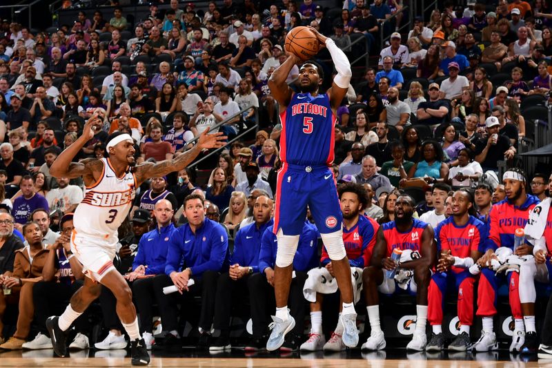 PHOENIX, AZ - OCTOBER 11: Malik Beasley #5 of the Detroit Pistons shoots a three point basket during the game on October 11, 2024 at Footprint Center in Phoenix, Arizona. NOTE TO USER: User expressly acknowledges and agrees that, by downloading and or using this photograph, user is consenting to the terms and conditions of the Getty Images License Agreement. Mandatory Copyright Notice: Copyright 2024 NBAE (Photo by Kate Frese/NBAE via Getty Images)