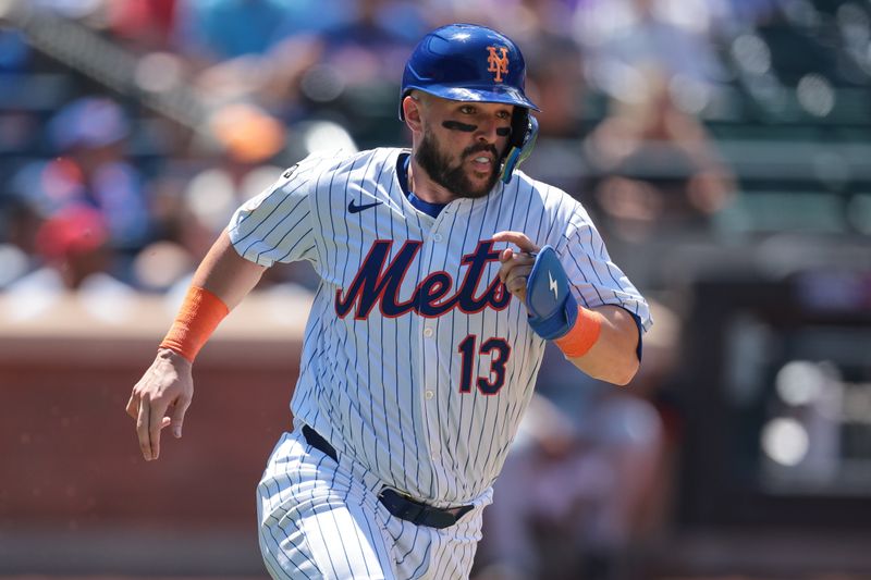 Jul 11, 2024; New York City, New York, USA; New York Mets catcher Luis Torrens (13) doubles during the fifth inning against the Washington Nationals at Citi Field. Mandatory Credit: Vincent Carchietta-USA TODAY Sports