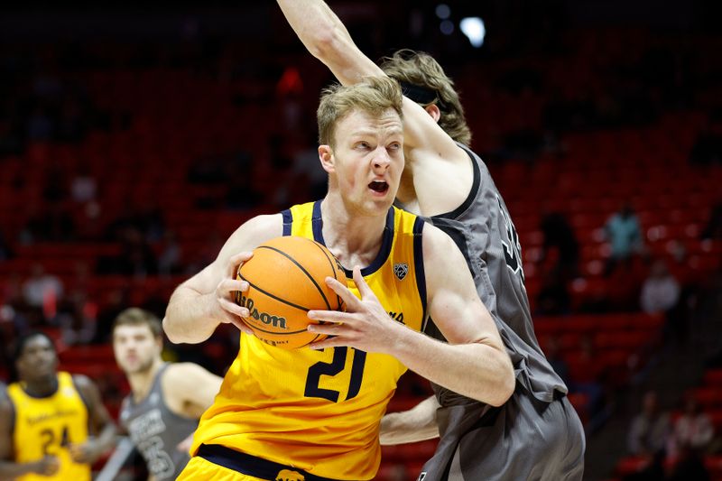 Feb 5, 2023; Salt Lake City, Utah, USA; California Golden Bears forward Lars Thiemann (21) looks to shoot against Utah Utes center Branden Carlson (35) in the first half at Jon M. Huntsman Center. Mandatory Credit: Jeffrey Swinger-USA TODAY Sports