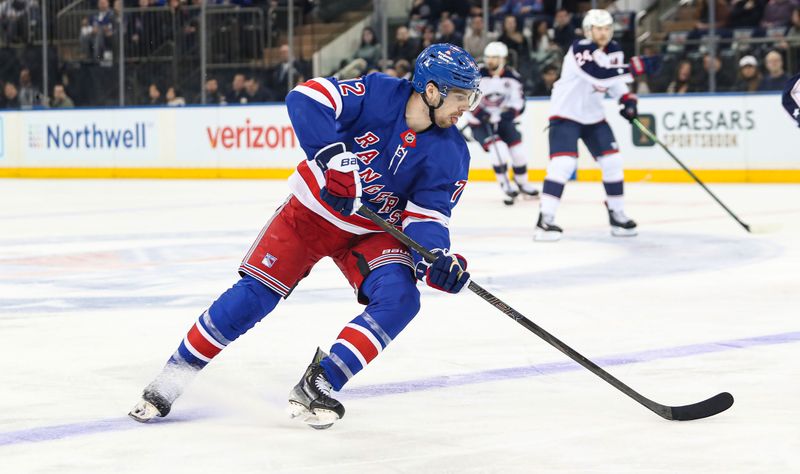 Jan 18, 2025; New York, New York, USA; New York Rangers center Filip Chytil (72) skates into the zone against the Columbus Blue Jackets during the first period at Madison Square Garden. Mandatory Credit: Danny Wild-Imagn Images