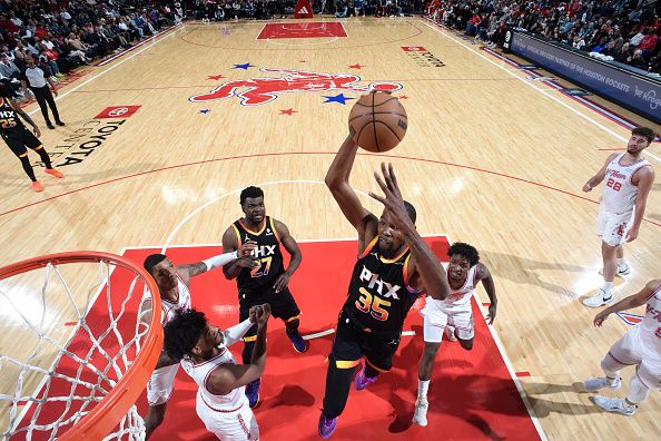 HOUSTON, TX - DECEMBER 27:   Kevin Durant #35 of the Phoenix Suns drives to the basket during the game against the Houston Rockets on December 27, 2023 at the Toyota Center in Houston, Texas. NOTE TO USER: User expressly acknowledges and agrees that, by downloading and or using this photograph, User is consenting to the terms and conditions of the Getty Images License Agreement. Mandatory Copyright Notice: Copyright 2023 NBAE (Photo by Logan Riely/NBAE via Getty Images)