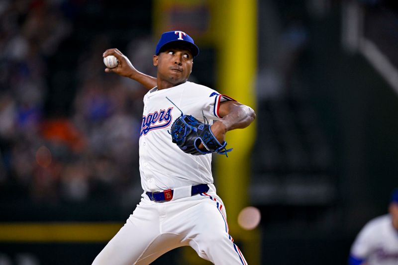 Aug 7, 2024; Arlington, Texas, USA;  Texas Rangers relief pitcher Jose Leclerc (25) pitches against the Houston Astros during the fifth inning at Globe Life Field. Mandatory Credit: Jerome Miron-USA TODAY Sports