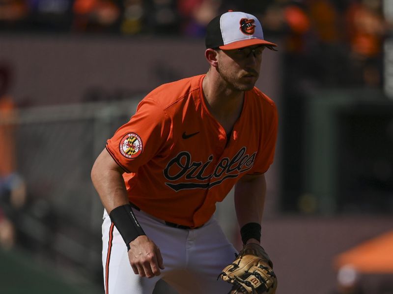 Jun 1, 2024; Baltimore, Maryland, USA;  h11 stands at third base during the second inning against the Tampa Bay Rays at Oriole Park at Camden Yards. Mandatory Credit: Tommy Gilligan-USA TODAY Sports