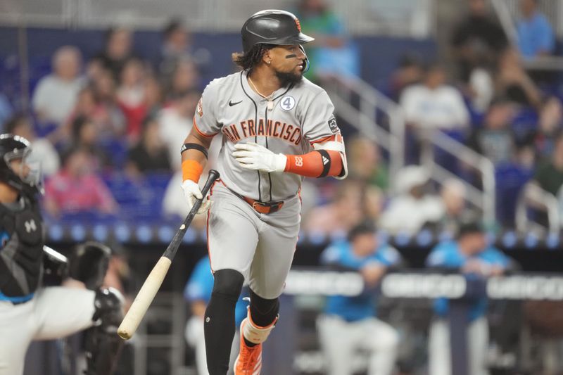 Jun 1, 2025; Miami, Florida, USA;  San Francisco Giants center fielder Luis Matos (29) rounds the bases after hitting a three-run home run in the fourth inning against the Miami Marlins at loanDepot Park. Mandatory Credit: Jim Rassol-Imagn Images