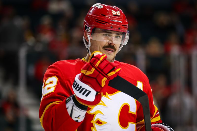 Nov 5, 2025; Calgary, Alberta, CAN; Calgary Flames defenseman MacKenzie Weegar (52) during the third period against the Columbus Blue Jackets at Scotiabank Saddledome. Mandatory Credit: Sergei Belski-Imagn Images