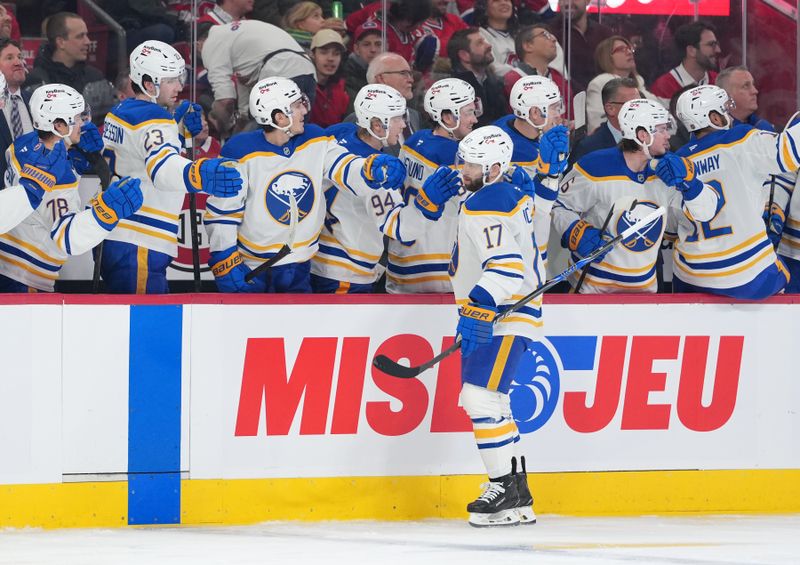 Jan 22, 2026; Montreal, Quebec, CAN; Buffalo Sabres forward Jason Zucker (17) celebrates with teammates after scoring a goal against the Montreal Canadiens during the first period at the Bell Centre. Mandatory Credit: Eric Bolte-Imagn Images