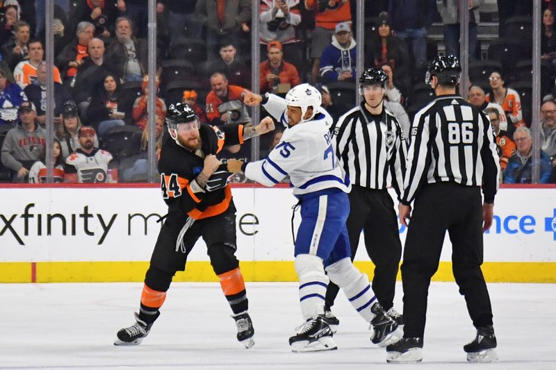 Mar 19, 2024; Philadelphia, Pennsylvania, USA; Philadelphia Flyers left wing Nicolas Deslauriers (44) and Toronto Maple Leafs right wing Ryan Reaves (75) fight during the first period at Wells Fargo Center. Mandatory Credit: Eric Hartline-USA TODAY Sports