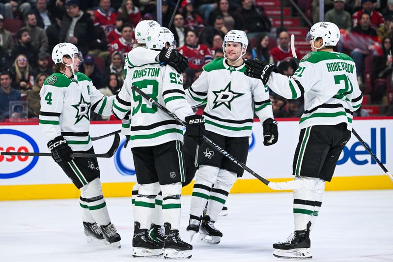 Nov 13, 2025; Montreal, Quebec, CAN; Dallas Stars center Wyatt Johnston (53) celebrates with his teammates his goal against the Montreal Canadiens during the first period at Bell Centre. Mandatory Credit: David Kirouac-Imagn Images