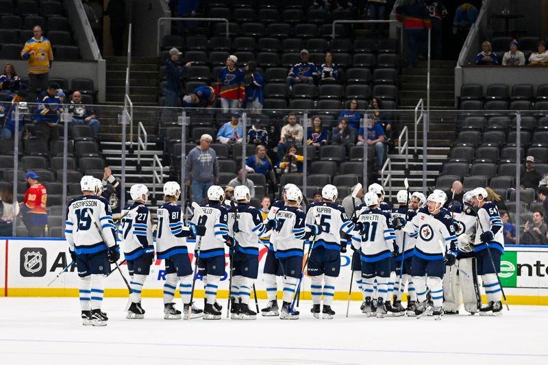 Nov 7, 2023; St. Louis, Missouri, USA;  Winnipeg Jets celebrate after defeating the St. Louis Blues at Enterprise Center. Mandatory Credit: Jeff Curry-USA TODAY Sports