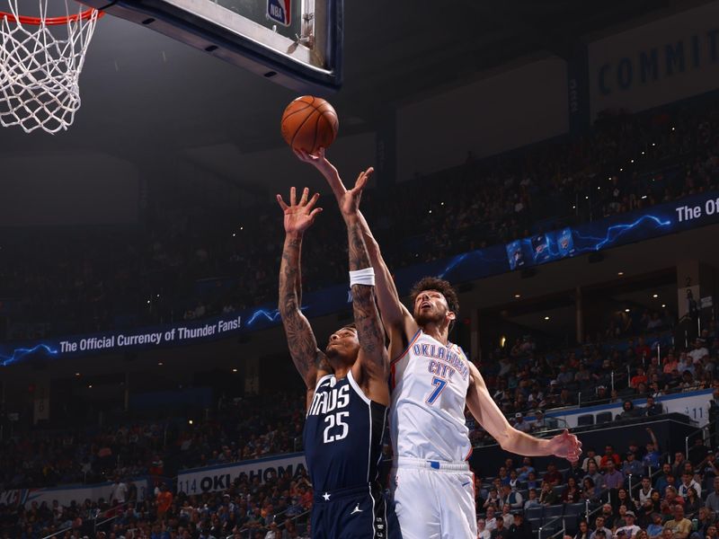 OKLAHOMA CITY, OK - MARCH 14: Chet Holmgren #7 of the Oklahoma City Thunder grabs a rebound during the game against the Dallas Mavericks on March 13, 2024 at Paycom Arena in Oklahoma City, Oklahoma. NOTE TO USER: User expressly acknowledges and agrees that, by downloading and or using this photograph, User is consenting to the terms and conditions of the Getty Images License Agreement. Mandatory Copyright Notice: Copyright 2024 NBAE (Photo by Zach Beeker/NBAE via Getty Images)