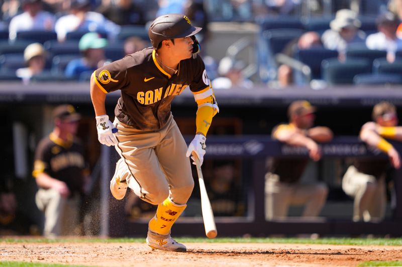 May 28, 2023; Bronx, New York, USA; San Diego Padres third baseman Ha-Seong Kim (7) runs out a single against the New York Yankees during the seventh inning at Yankee Stadium. Mandatory Credit: Gregory Fisher-USA TODAY Sports