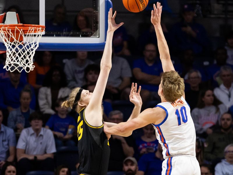 Feb 28, 2024; Gainesville, Florida, USA; Florida Gators forward Thomas Haugh (10) shoots over Missouri Tigers center Connor Vanover (75) during the first half at Exactech Arena at the Stephen C. O'Connell Center. Mandatory Credit: Matt Pendleton-USA TODAY Sports