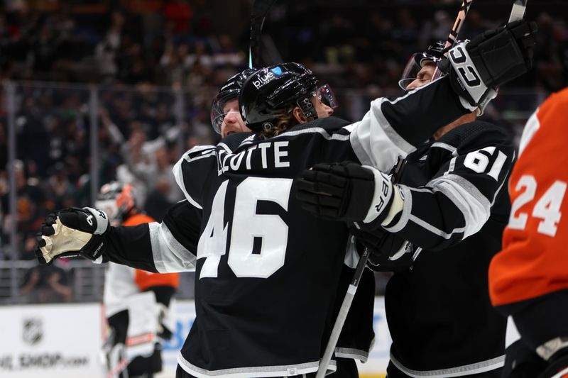 Nov 11, 2023; Los Angeles, California, USA;  Los Angeles Kings right wing Carl Grundstrom (91) celebrates with center Blake Lizotte (46) after scoring a goal during the second period against the Philadelphia Flyers at Crypto.com Arena. Mandatory Credit: Kiyoshi Mio-USA TODAY Sports