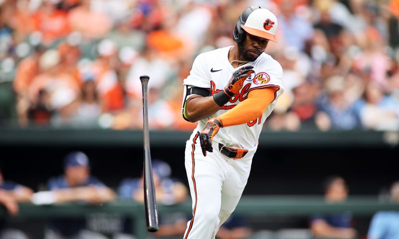 Jun 2, 2024; Baltimore, Maryland, USA; Baltimore Orioles outfielder Cedric Mullins (31) throws his bat during the sixth inning against the Tampa Bay Rays at Oriole Park at Camden Yards. Mandatory Credit: Daniel Kucin Jr.-USA TODAY Sports