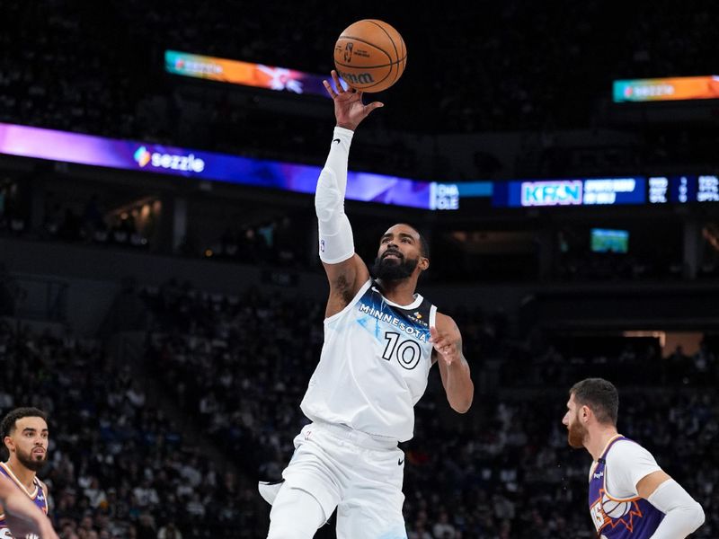 MINNEAPOLIS, MN -  NOVEMBER 17: Mike Conley #10 of the Minnesota Timberwolves shoots the ball during the game against the Phoenix Suns on November 17, 2024 at Target Center in Minneapolis, Minnesota. NOTE TO USER: User expressly acknowledges and agrees that, by downloading and or using this Photograph, user is consenting to the terms and conditions of the Getty Images License Agreement. Mandatory Copyright Notice: Copyright 2024 NBAE (Photo by Jordan Johnson/NBAE via Getty Images)