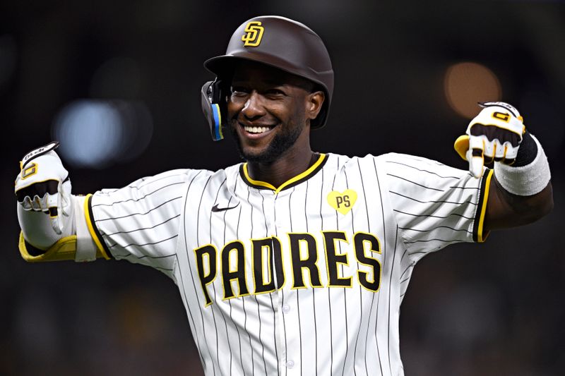 Jun 25, 2024; San Diego, California, USA; San Diego Padres left fielder Jurickson Profar (10) celebrates after hitting a grand slam home run against the Washington Nationals during the sixth inning at Petco Park. Mandatory Credit: Orlando Ramirez-USA TODAY Sports