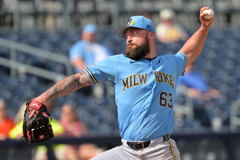 Feb 23, 2026; Peoria, Arizona, USA;  Milwaukee Brewers pitcher Drew Rom (63) delivers to the plate against the San Diego Padres at Peoria Sports Complex. Mandatory Credit: Jayne Kamin-Oncea-Imagn Images