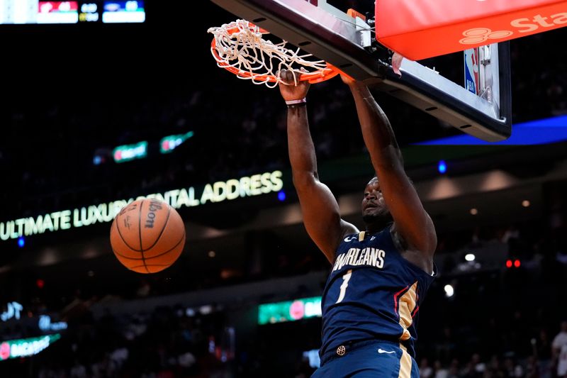 MIAMI, FLORIDA - MARCH 22: Zion Williamson #1 of the New Orleans Pelicans dunks the ball against the Miami Heat during the third quarter at Kaseya Center on March 22, 2024 in Miami, Florida. NOTE TO USER: User expressly acknowledges and agrees that, by downloading and or using this photograph, User is consenting to the terms and conditions of the Getty Images License Agreement. (Photo by Rich Storry/Getty Images)