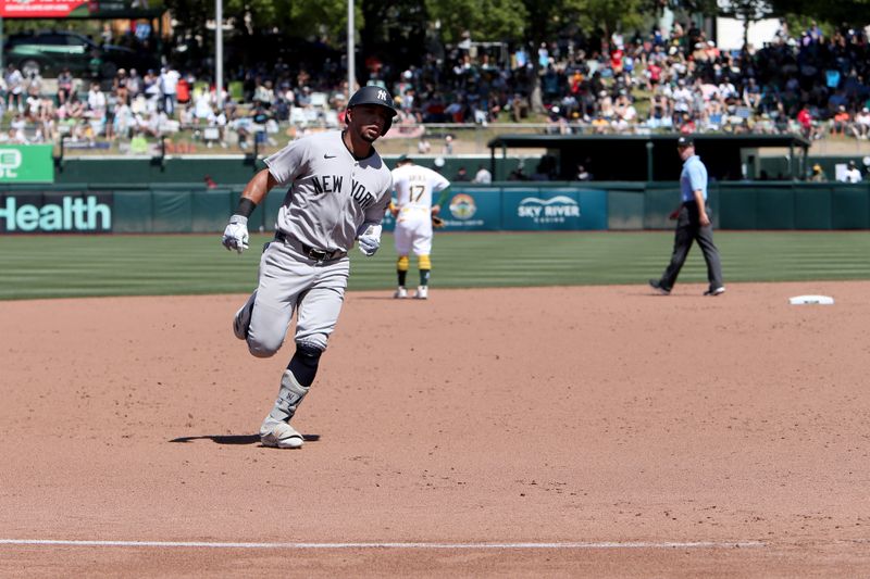 May 10, 2025; West Sacramento, California, USA; New York Yankees third baseman Oswald Peraza (18) rounds the bases after hitting a two run home run against the Athletics during the sixth inning at Sutter Health Park. Mandatory Credit: Dennis Lee-Imagn Images