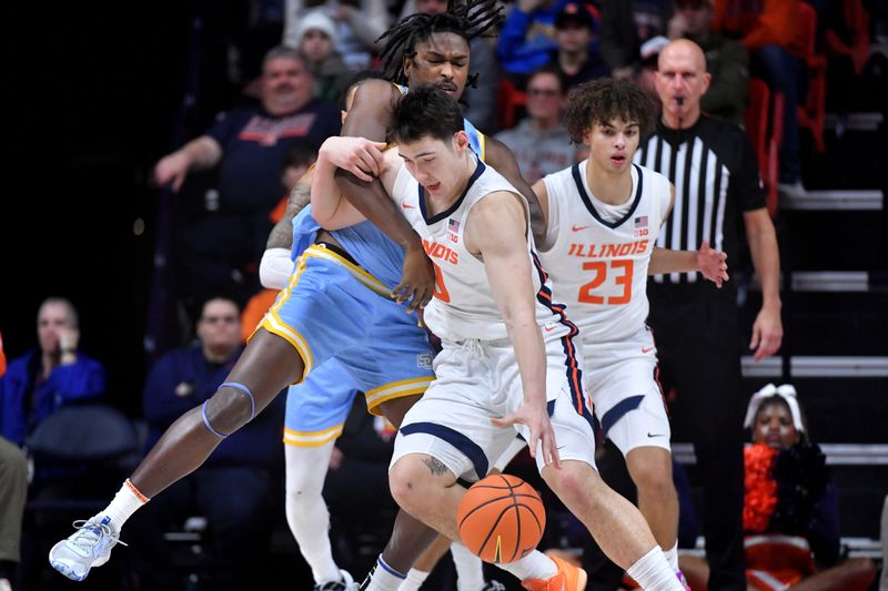 Dec 29, 2025; Champaign, Illinois, USA;  Illinois Fighting Illini forward David Mirkovic (0) drives the ball around Southern University Jaguars forward AJ Barnes (12) during the second half at State Farm Center. Mandatory Credit: Ron Johnson-Imagn Images