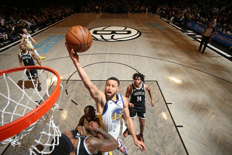 BROOKLYN, NY - FEBRUARY 5: Stephen Curry #30 of the Golden State Warriors shoots the ball during the game against the Brooklyn Nets  on February 5, 2024 at Barclays Center in Brooklyn, New York. NOTE TO USER: User expressly acknowledges and agrees that, by downloading and or using this Photograph, user is consenting to the terms and conditions of the Getty Images License Agreement. Mandatory Copyright Notice: Copyright 2024 NBAE (Photo by Nathaniel S. Butler/NBAE via Getty Images)