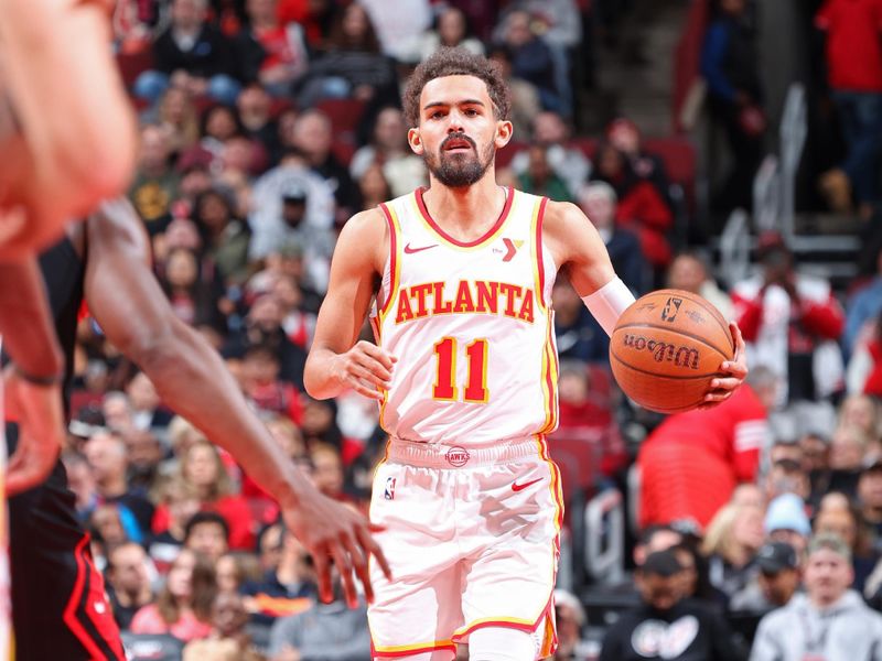 CHICAGO, IL - NOVEMBER 22: Trae Young #11 of the Atlanta Hawks brings the ball up court during the game against the Chicago Bulls during the Emirates NBA Cup game on November 22, 2024 at United Center in Chicago, Illinois. NOTE TO USER: User expressly acknowledges and agrees that, by downloading and or using this photograph, User is consenting to the terms and conditions of the Getty Images License Agreement. Mandatory Copyright Notice: Copyright 2024 NBAE (Photo by Jeff Haynes/NBAE via Getty Images)