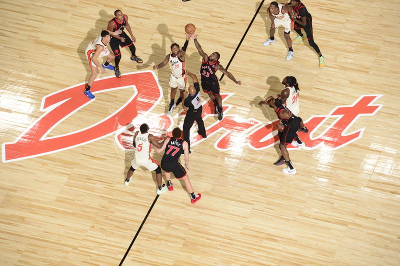 DETROIT, MI - NOVEMBER 24: Marcus Sasser #25 of the Detroit Pistons and Jamal Shead #23 of the Toronto Raptors go up for the opening tip off during the game on November 24, 2024 at Little Caesars Arena in Detroit, Michigan. NOTE TO USER: User expressly acknowledges and agrees that, by downloading and/or using this photograph, User is consenting to the terms and conditions of the Getty Images License Agreement. Mandatory Copyright Notice: Copyright 2024 NBAE (Photo by Chris Schwegler/NBAE via Getty Images)