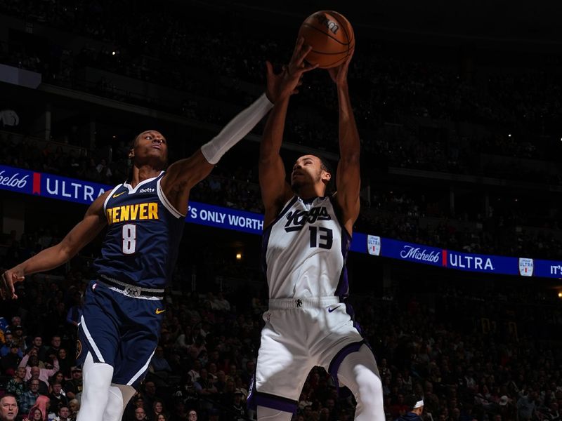 DENVER, CO - FEBRUARY 14: Keegan Murray #13 of the Sacramento Kings rebounds the ball during the game against the Denver Nuggets on February 14, 2024 at the Ball Arena in Denver, Colorado. NOTE TO USER: User expressly acknowledges and agrees that, by downloading and/or using this Photograph, user is consenting to the terms and conditions of the Getty Images License Agreement. Mandatory Copyright Notice: Copyright 2024 NBAE (Photo by Garrett Ellwood/NBAE via Getty Images)