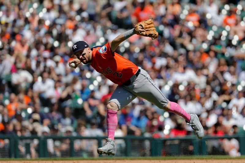 May 12, 2024; Detroit, Michigan, USA;  Houston Astros third baseman Alex Bregman (2) makes a throw to first in the fifth inning against the Detroit Tigers at Comerica Park. Mandatory Credit: Rick Osentoski-USA TODAY Sports