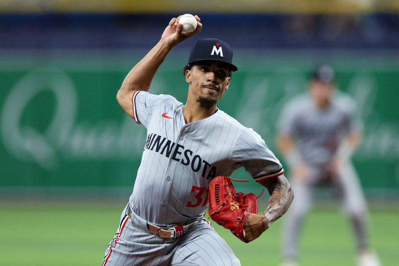 Sep 2, 2024; St. Petersburg, Florida, USA; Minnesota Twins pitcher Ronny Henriquez (31) throws a pitch against the Tampa Bay Rays in the sixth inning at Tropicana Field. Mandatory Credit: Nathan Ray Seebeck-USA TODAY Sports