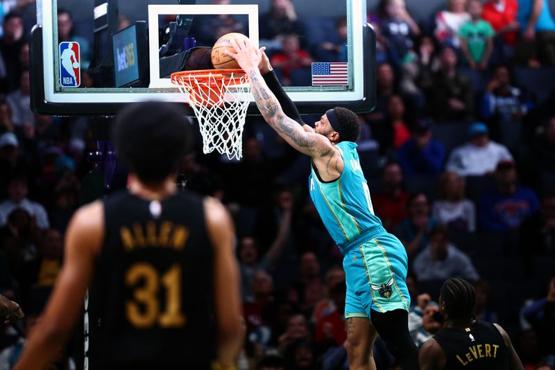 CHARLOTTE, NORTH CAROLINA - MARCH 27: Miles Bridges #0 of the Charlotte Hornets dunks the ball during the second half of the game against the Cleveland Cavaliers at Spectrum Center on March 27, 2024 in Charlotte, North Carolina. NOTE TO USER: User expressly acknowledges and agrees that, by downloading and or using this photograph, User is consenting to the terms and conditions of the Getty Images License Agreement. (Photo by Jared C. Tilton/Getty Images)