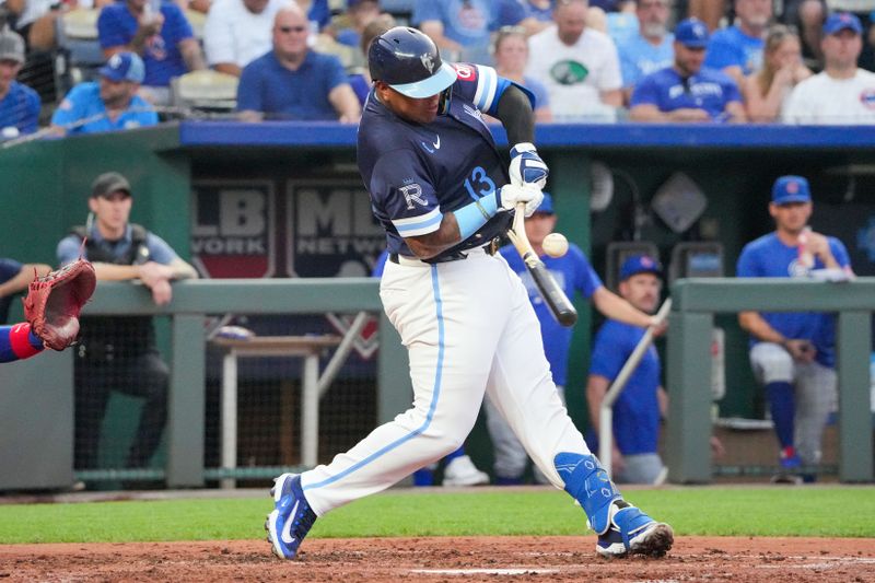 Jul 26, 2024; Kansas City, Missouri, USA; Kansas City Royals catcher Salvador Perez (13) breaks his bat against the Chicago Cubs in the fourth inning at Kauffman Stadium. Mandatory Credit: Denny Medley-USA TODAY Sports