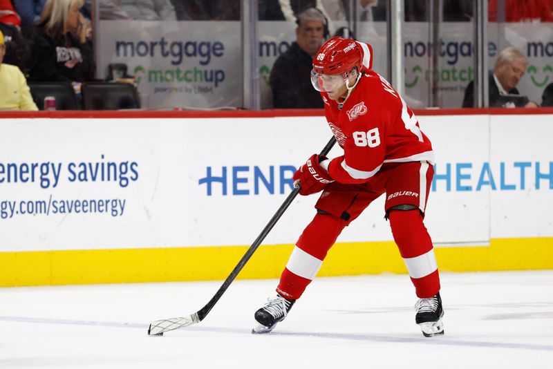 Nov 15, 2025; Detroit, Michigan, USA;  Detroit Red Wings right wing Patrick Kane (88) skates with the puck in the second period against the Buffalo Sabres at Little Caesars Arena. Mandatory Credit: Rick Osentoski-Imagn Images