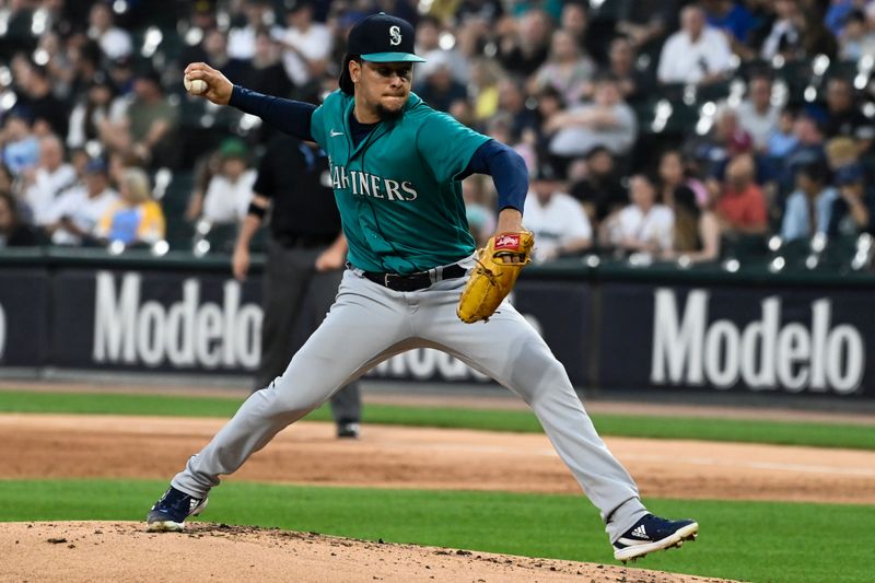 Aug 21, 2023; Chicago, Illinois, USA;   Seattle Mariners starting pitcher Luis Castillo (58) delvers against the Chicago White Sox during the first inning at Guaranteed Rate Field. Mandatory Credit: Matt Marton-USA TODAY Sports