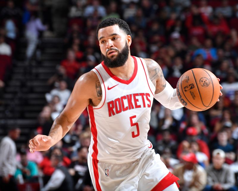 HOUSTON, TX - OCTOBER 17: Fred VanVleet #5 of the Houston Rockets looks on during the game against the San Antonio Spurs on October 17, 2024 at the Toyota Center in Houston, Texas. NOTE TO USER: User expressly acknowledges and agrees that, by downloading and or using this photograph, User is consenting to the terms and conditions of the Getty Images License Agreement. Mandatory Copyright Notice: Copyright 2024 NBAE (Photo by Logan Riely/NBAE via Getty Images)