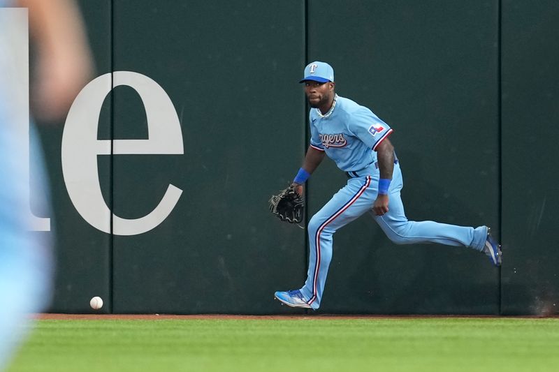 Aug 20, 2023; Arlington, Texas, USA; Texas Rangers manager Bruce Bochy (15) chases the triple hit by Milwaukee Brewers right fielder Tyrone Taylor (not shown) during the eighth inning at Globe Life Field. Mandatory Credit: Jim Cowsert-USA TODAY Sports