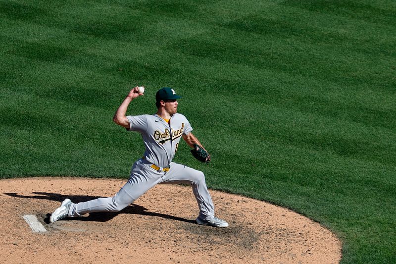 Aug 13, 2023; Washington, District of Columbia, USA; Oakland Athletics relief pitcher Trevor May (65) pitches against the Washington Nationals during the ninth inning at Nationals Park. Mandatory Credit: Geoff Burke-USA TODAY Sports