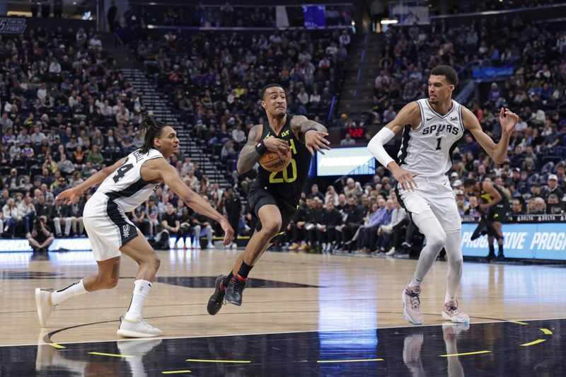 SALT LAKE CITY, UT - MARCH 27: John Collins #20 of the Utah Jazz drives to the basket during the game against the San Antonio Spurs on March 27, 2024 at Delta Center in Salt Lake City, Utah. NOTE TO USER: User expressly acknowledges and agrees that, by downloading and or using this Photograph, User is consenting to the terms and conditions of the Getty Images License Agreement. Mandatory Copyright Notice: Copyright 2024 NBAE (Photo by Chris Nicoll/NBAE via Getty Images)