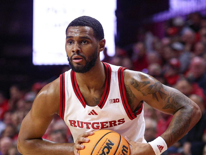 Jan 13, 2025; Piscataway, New Jersey, USA; Rutgers Scarlet Knights guard Tyson Acuff (5) looks to pass during the second half against the UCLA Bruins at Jersey Mike's Arena. Mandatory Credit: Vincent Carchietta-Imagn Images