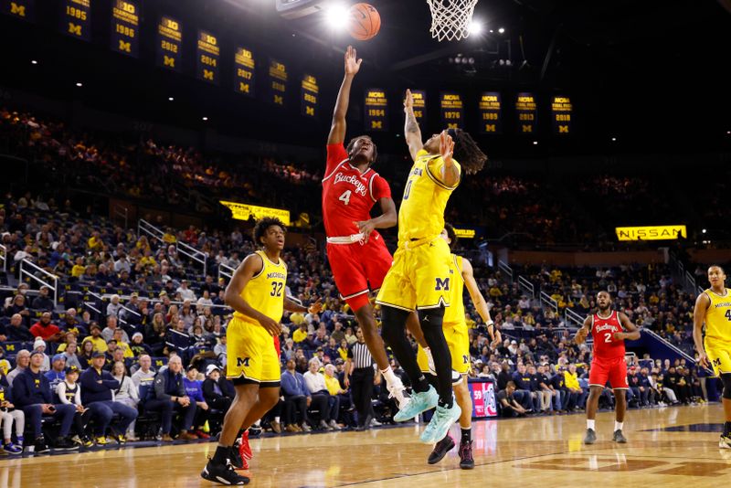 Jan 15, 2024; Ann Arbor, Michigan, USA; Ohio State Buckeyes guard Dale Bonner (4) shoots as Michigan Wolverines guard Dug McDaniel (0) defends in the second half at Crisler Center. Mandatory Credit: Rick Osentoski-USA TODAY Sports