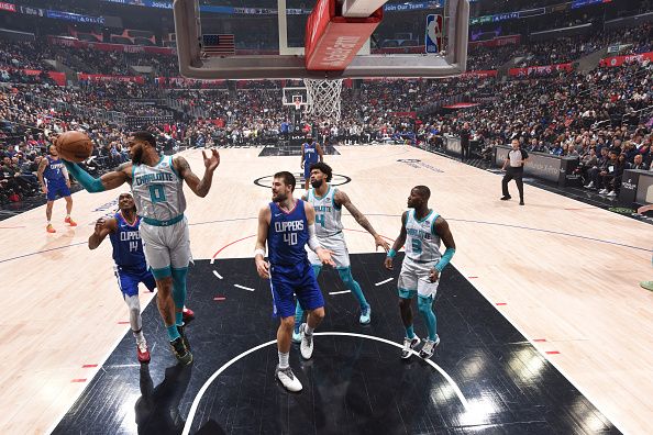 LOS ANGELES, CA - DECEMBER 26:  Miles Bridges #0 of the Charlotte Hornets grabs the rebound during the game  on December 26, 2023 at Crypto.Com Arena in Los Angeles, California. NOTE TO USER: User expressly acknowledges and agrees that, by downloading and/or using this Photograph, user is consenting to the terms and conditions of the Getty Images License Agreement. Mandatory Copyright Notice: Copyright 2023 NBAE (Photo by Juan Ocampo/NBAE via Getty Images)