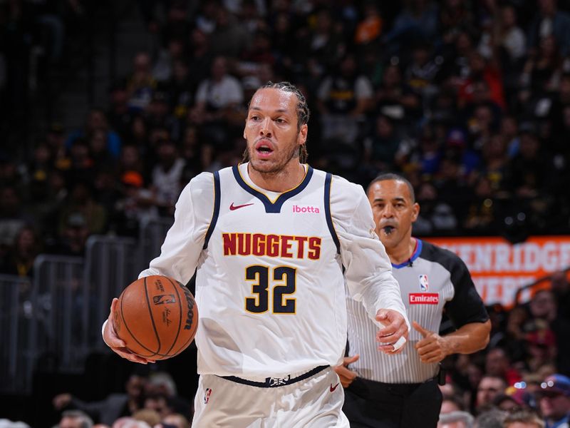 DENVER, CO - OCTOBER 13: Aaron Gordon #32 of the Denver Nuggets dribbles the ball during the game against the Phoenix Suns on October 13, 2024 at Ball Arena in Denver, Colorado. NOTE TO USER: User expressly acknowledges and agrees that, by downloading and/or using this Photograph, user is consenting to the terms and conditions of the Getty Images License Agreement. Mandatory Copyright Notice: Copyright 2024 NBAE (Photo by Garrett Ellwood/NBAE via Getty Images)