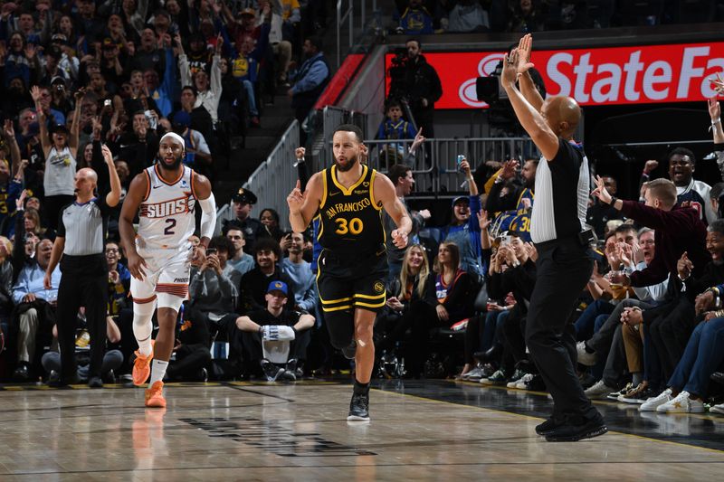 SAN FRANCISCO, CA - FEBRUARY 10: Stephen Curry #30 of the Golden State Warriors reacts to a play during the game against the Phoenix Suns on February 10, 2024 at Chase Center in San Francisco, California. NOTE TO USER: User expressly acknowledges and agrees that, by downloading and or using this photograph, user is consenting to the terms and conditions of Getty Images License Agreement. Mandatory Copyright Notice: Copyright 2024 NBAE (Photo by Noah Graham/NBAE via Getty Images)